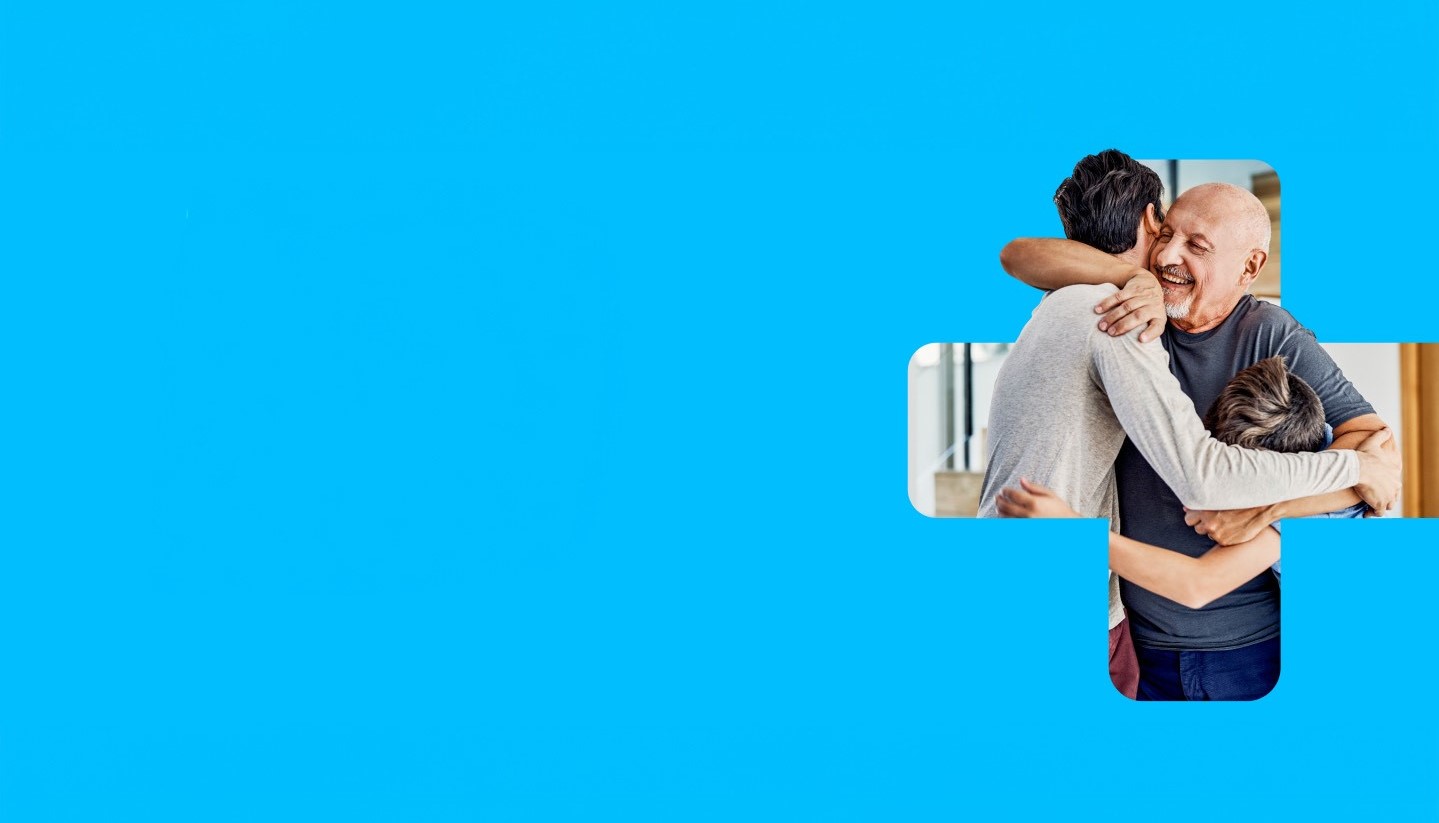 The image features two people sharing a hug, with their faces obscured by a brown rectangle, set against a vibrant blue background. The person on the left is dressed in grey, while the one on the right wears blue.