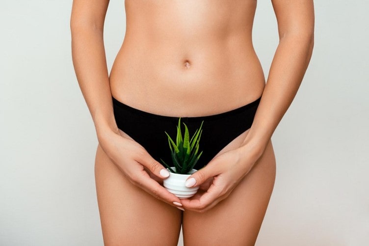 women holding plant in underwear
