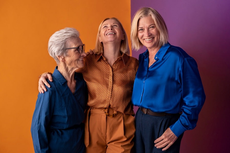 Group of women at different ages looking happy as they have chosen the best incontinence pads for them